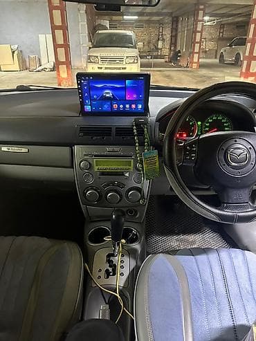 Mazda Demio: 2003 г., 1.5 л, Автомат, Бензин, Хэтчбэк