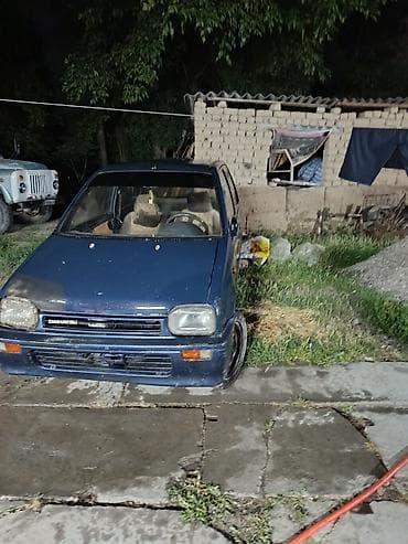 Daihatsu Cuore: 1992 г. — 1