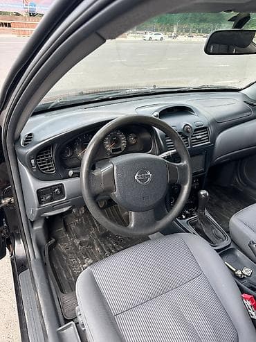 Унаа: Nissan Almera Classic: 2006 г., 1.6 л, Кол менен иштөөчү, Бензин, Седан — 6