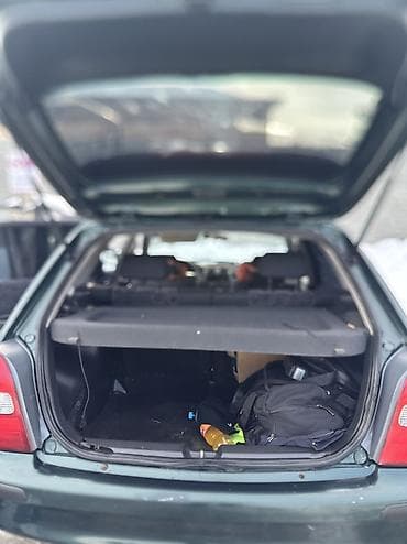 mazda 323 2003: Mazda 323: 2000 г., 1.6 л, Механика, Бензин, Универсал — 4