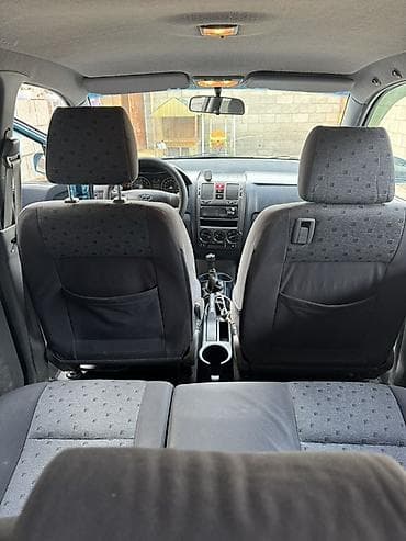 kia tucson: Hyundai Getz: 2002 г., Механика, Бензин, Хэтчбэк — 7