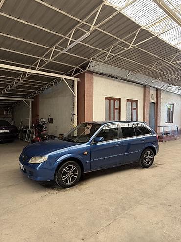 сокулук арал: Mazda 323: 2001 г., 1.6 л, Кол менен иштөөчү, Бензин, Хетчбек — 1