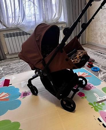 Прогулочная коляска Anex (бренд на раме). Компактная, маневренная, в