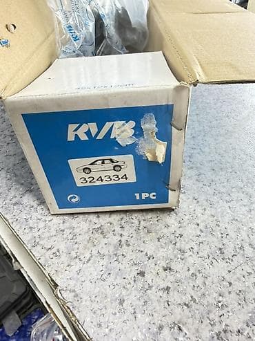 Передний амортизатор Lexus 2005 г.