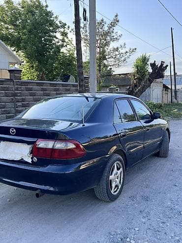 стоп gx: Mazda 626: 2000 г., 2 л, Механика, Бензин, Седан — 7