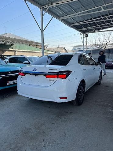 голф 1 8: Toyota Corolla: 2019 г., 1.8 л, Вариатор, Электромобиль, Седан — 6