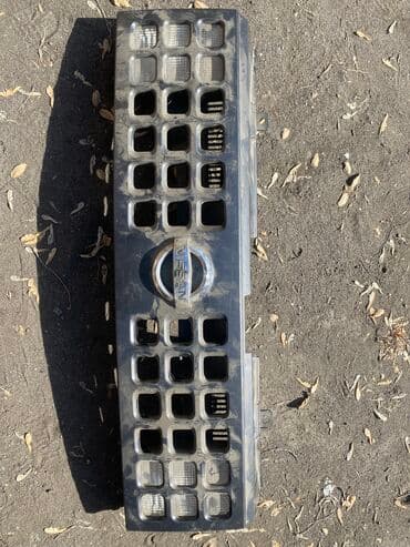 Ниссан куб решетка радиатора