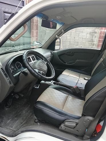 sprinter 2 7: Hyundai Porter II грузовой бортовой пикап - Тип: малотоннажный — 6