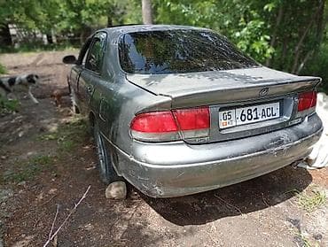 авто чанган: Mazda 626: 1992 г., 0.2 - engine capacity л, Кол менен иштөөчү, Бензин, Седан — 6