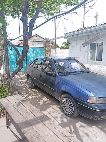 Транспорт: Daewoo Nexia: 2005 г., Механика, Бензин, Седан — 4