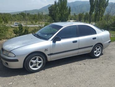 шины на нивы: Mitsubishi Carisma: 2002 г., 1.6 л, Автомат, Бензиновая, Хэтчбэк — 1