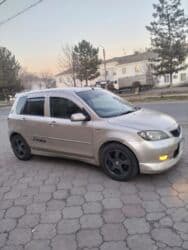 помощь авто: Mazda Demio: 2003 г., 1.3 л, Автомат, Бензин, Седан — 1