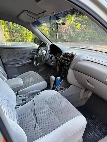 перекурить авто: Mazda Capella: 2000 г., Седан — 7