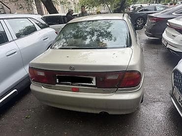 mazda 121: Mazda 323: 1996 г., 1.5 л, Механика, Бензин, Седан — 4