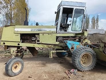 Самоходный зерноуборочный комбайн «303» с кабиной оператора