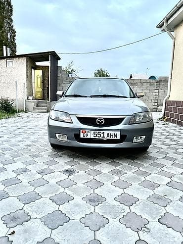 Mazda 323: 2002 г., 1.6 л, Механика, Бензин, Хэтчбэк