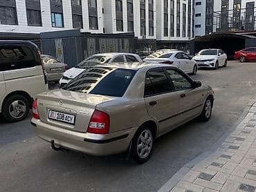 step rf3: Mazda 323: 1998 г., 1.5 л, Механика, Бензин, Седан — 5