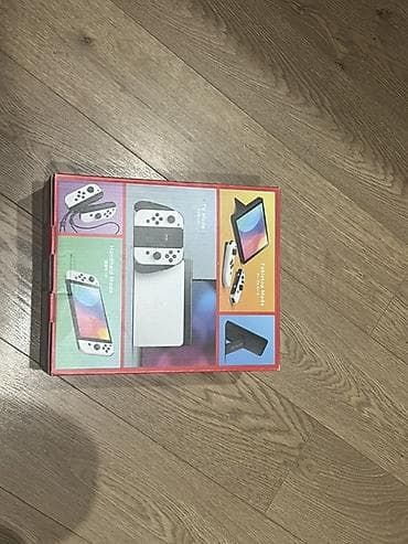 Nintendo Switch OLED: Nintendo Switch OLED (белая версия) Комплектация: - Консоль Nintendo — 2