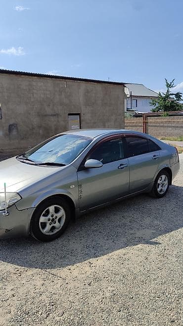 Nissan Primera: 2002 г., Седан — 4
