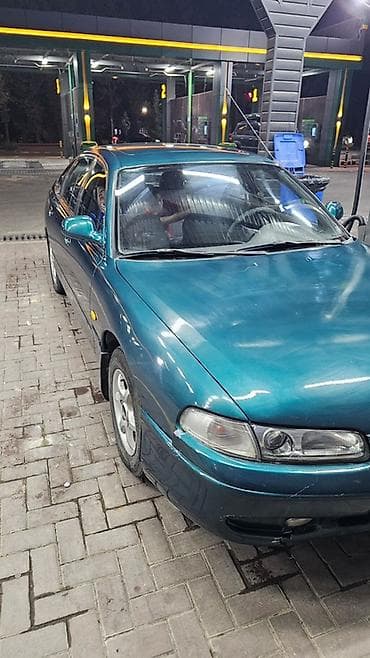 Продажа авто: Mazda 626: 1993 г., 2 л, Механика, Бензин, Хэтчбэк — 4