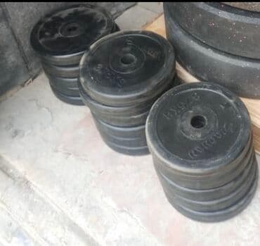 книги художественная литература: Блины для штанги / грифа 
Прорезиненные 
Ассортимент — 1