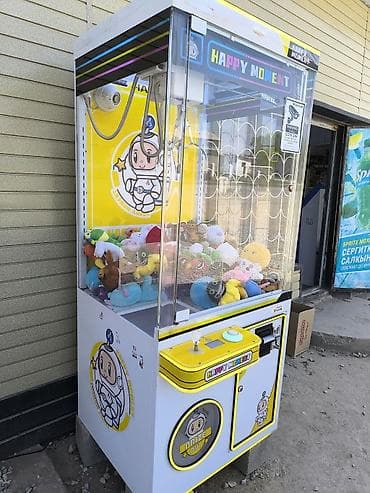 монолитный каркас: Состояние отличное. Плюсом идут игрушки. Игровой автомат «кран-машина» — 2