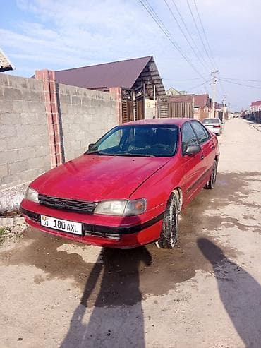 полик на машине: Toyota Carina E: 1993 г., Седан — 7