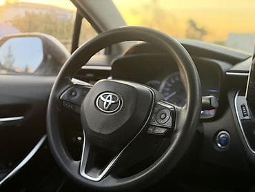 Продажа авто: Toyota Corolla: 2019 г., 1.8 л, Вариатор, Гибрид, Седан — 6