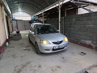 forester 2003: Mazda Demio: 2003 г., Автомат, Хэтчбэк — 1