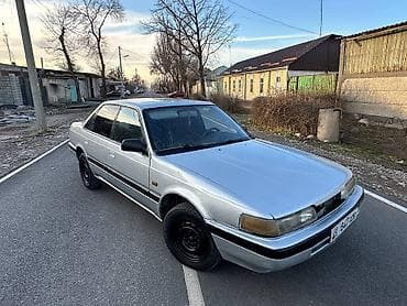 муссо истана: Mazda 626: 1990 г., Седан — 1