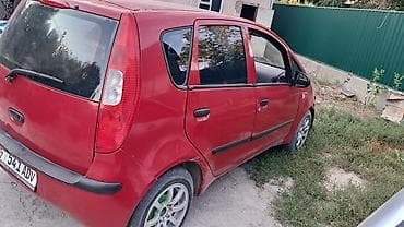 круглый: Mitsubishi Colt: 2006 г., 1.3 л, Механика, Бензин, Хэтчбэк — 9