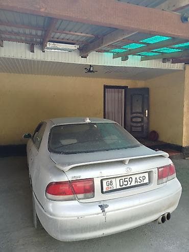 mazda демио: Mazda 626: 1993 г., Седан — 2