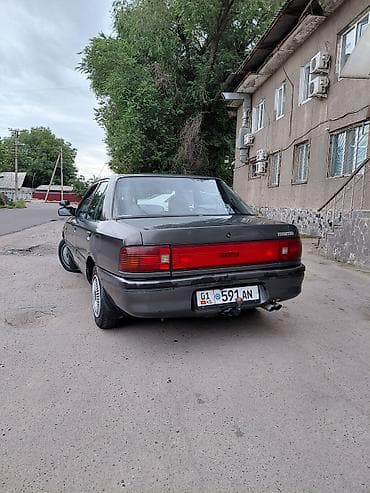 бампер мазда капелла: Mazda 323: 1992 г., 1.6 л, Автомат, Бензин, Седан — 5