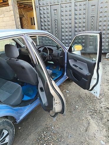 Унаа сатуу: Toyota Duet: 2003 г., 1 л, Автомат, Бензин, Хетчбек — 5