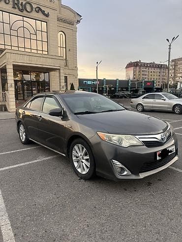 люк 124: Toyota Camry: 2013 г., 2.5 л, Автомат, Гибрид, Седан — 1
