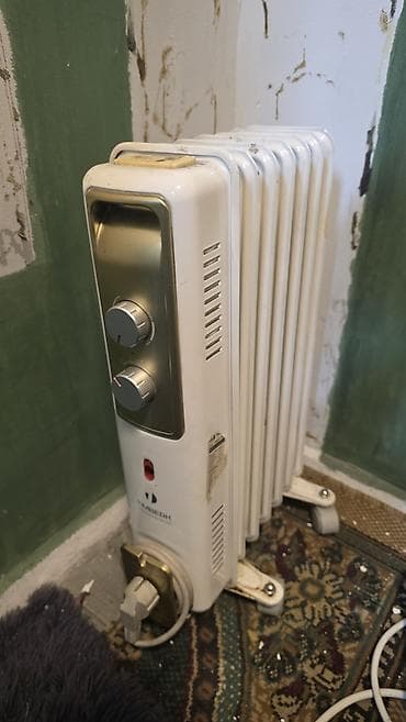 type c type c: Масляный обогреватель Timberk, Кол-во секций: 7, Несколько режимов мощности — 1