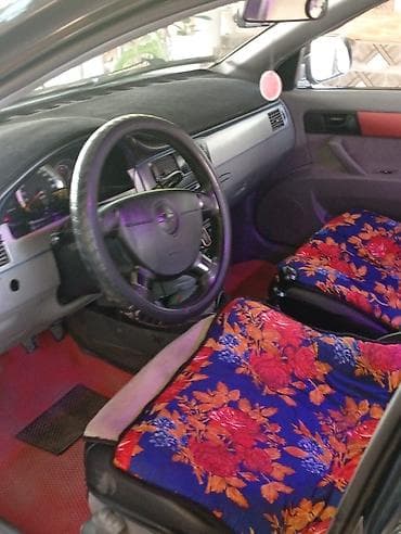Унаа: Chevrolet Lacetti: 2010 г., 1.4 л, Кол менен иштөөчү, Бензин, Седан — 3