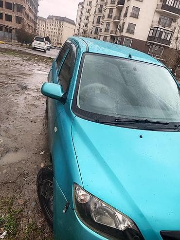 colf 2: Mazda Demio: 2002 г., 1.3 л, Автомат, Бензин, Хэтчбэк — 3