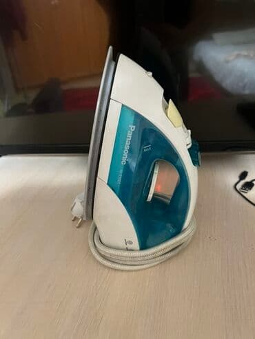 Утюг Panasonic с пароувлажнением - Бренд: Panasonic - Корпус: белый с