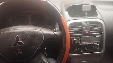 eclipse cross: Mitsubishi Carisma: 2003 г., 1.6 л, Механика, Бензин, Седан — 1