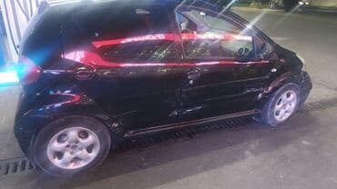 машина арзан: Представляем компактный черный хэтчбек, идеально подходящий для — 1