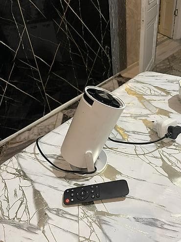 Портативный мини‑проектор с пультом ДУ - Компактный цилиндрический