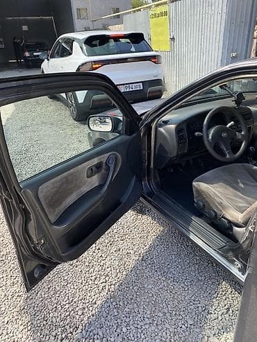devo tiko: Nissan Primera: 1992 г., 1.6 л, Механика, Бензин, Седан — 5
