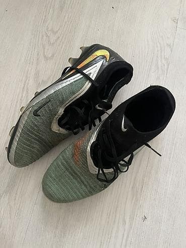 обувь зимный: Футбольные бутсы Nike с шнуровкой и низким носком. - Модель: Nike — 1