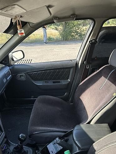 mazda cronos: Chevrolet Nexia: 2011 г., 1.6 л, Механика, Бензин, Седан — 9