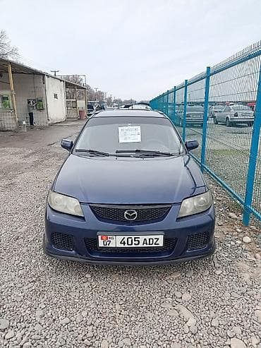 mazda 323 f: Mazda 323: 2002 г., 1.6 л, Ручные, Бензин, Хэтчбэк — 10