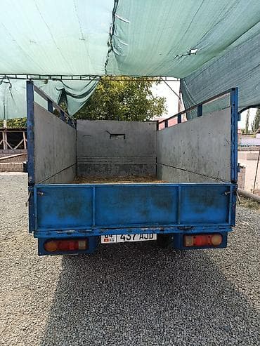 Грузовой бортовой мини-грузовик Hyundai Porter (кабина над — 2