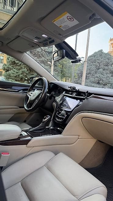 45: Cadillac : 2013 г., Автомат, Бензин, Седан — 7