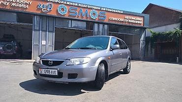 Mazda Familia: 2003 г., 1.6 л, Механика, Бензин, Универсал — 1
