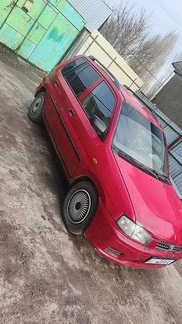 койго алмашам: Mazda Demio: 1998 г., 1.3 л, Кол менен иштөөчү, Бензин, Van — 1